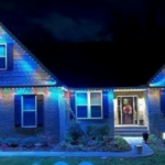 Beautiful permanent holiday lighting installed on a home. Energy-efficient LED lights for year-round sparkle.