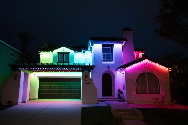 Orange County residential home with professionally installed permanent LED lighting along rooflines and architectural features